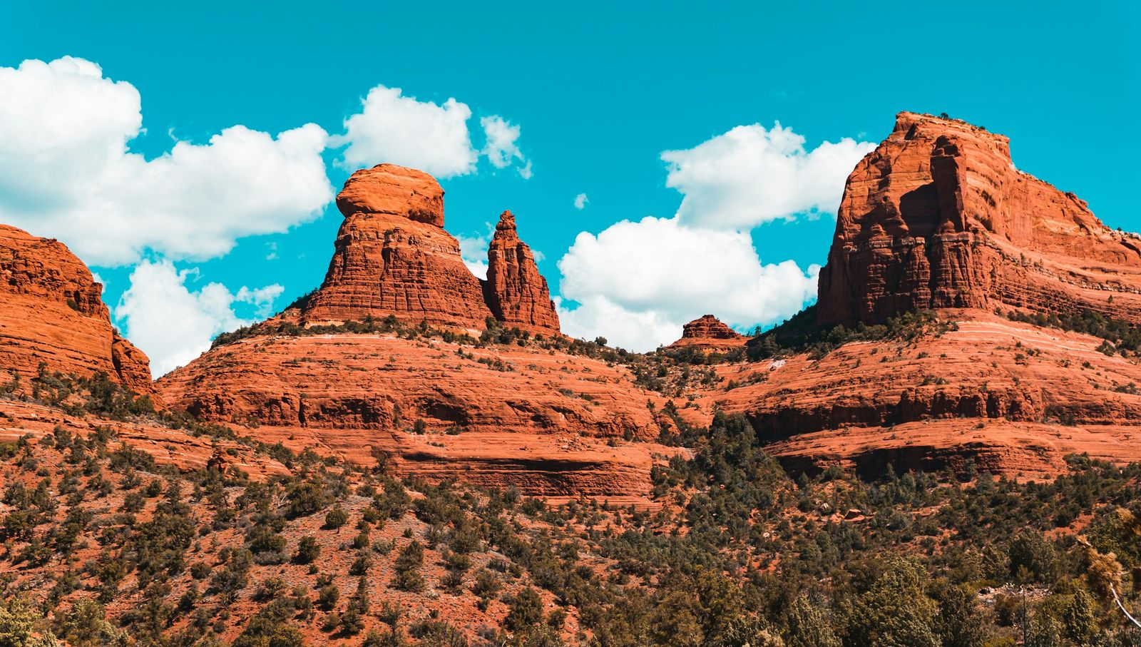 Red rock formations in Sedona, Arizona, under a blue sky